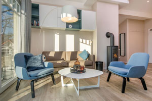 Villa Düne 4 Appartement 8 Wohnzimmer mit Kamin