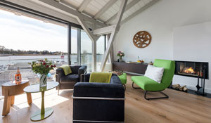 „Alte Scheune am Focker Strom“ - Ferienhaus auf Ummanz Appartement 1 Sea Lounge mit Panoramablick OG