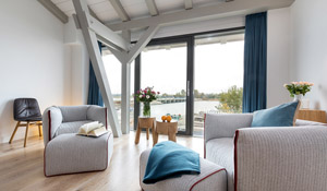 „Alte Scheune am Focker Strom“ - Ferienhaus auf Ummanz Appartement 3 Sea Lounge mit Panoramablick OG